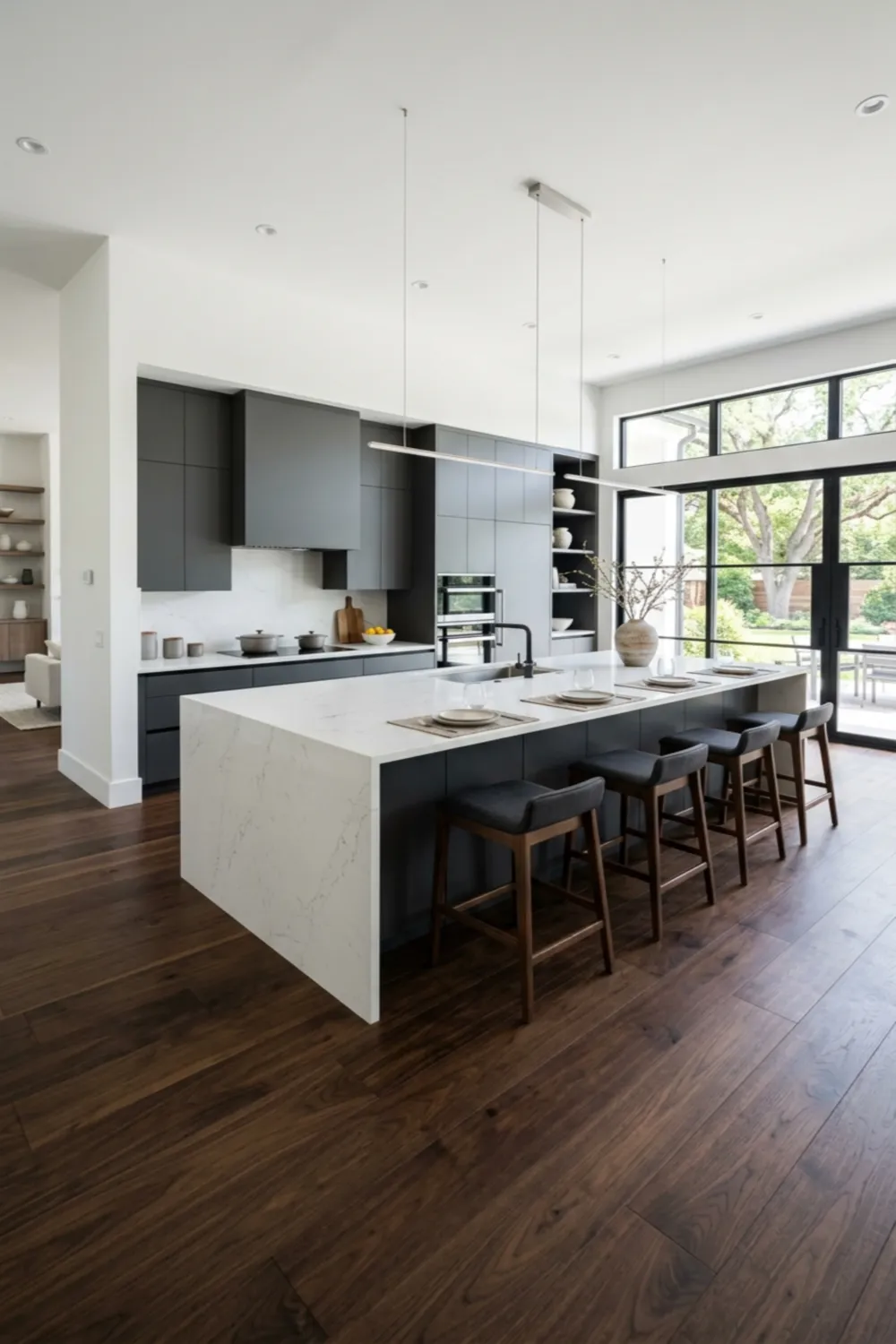 Modern Kitchen with Dark Floors and Large Island